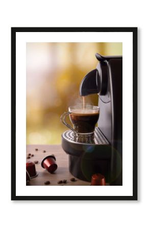 Espresso machine making coffee on wood table vertical compositio