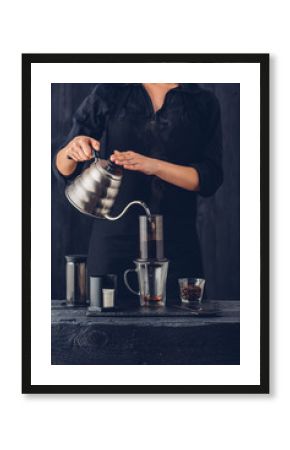 Professional barista preparing coffee alternative method