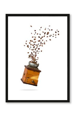 Coffee beans flying from the grinder on white background