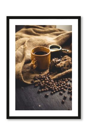 Black coffee Arabica In brown glass And milk and dessert Sack background in low light area