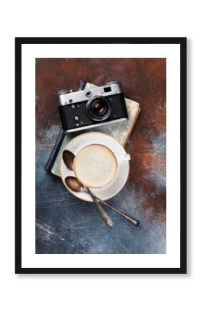 Coffee cup and retro camera