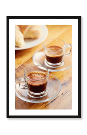 Cups of Espresso on old wooden table