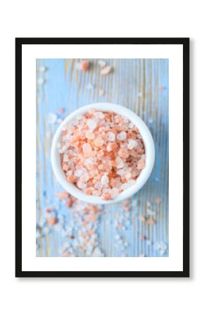 himalayan pink salt on wooden surface