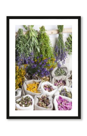Healing medical herbs in a linen sacks.