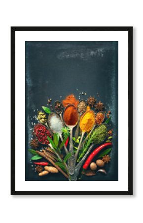 Various herbs and spices on dark background