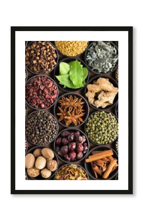 bright  spices and herbs in cups, top view. background for packing with European condiments.