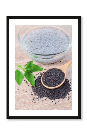 Lemon basil seeds in wooden spoon and soak.