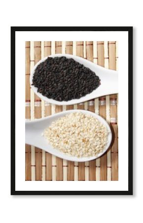 black and white sesame seeds on ceramic spoon