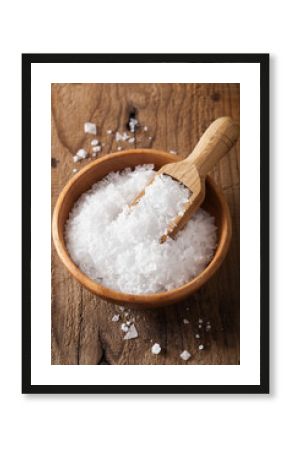 sea salt in wooden bowl and scoop