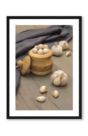 garlic on a wooden kitchen table. 