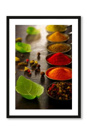 Wooden table of colorful spices