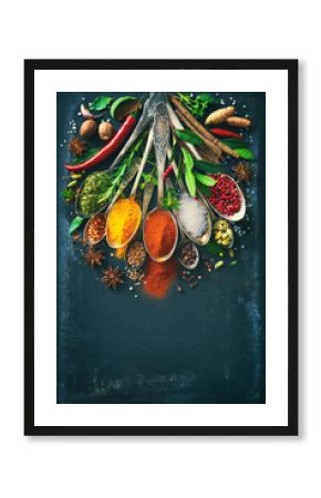 Various herbs and spices on dark background