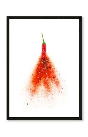 Chili powder burst from red chili pepper