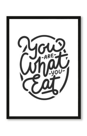 You are what you eat, modern ink brush calligraphy with splash. Handwritten lettering.