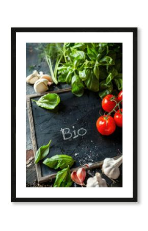 fresh vegetables on the table plate for text with the inscription bio