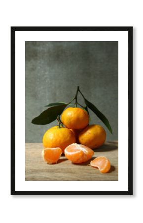Still life with orange fruites on wooden table