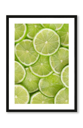 Green background with citrus-fruit of lime slices