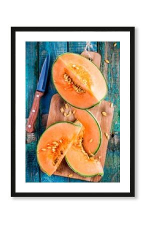 sliced ripe melon on a cutting board