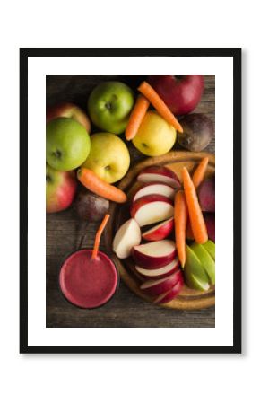 Glass of fresh beetroot, apple and carrot juice