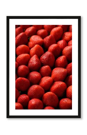 Fresh ripe strawberries as background.
