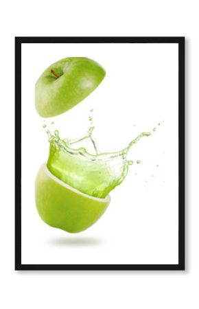 juice splashing out of a green apple isolated on white background