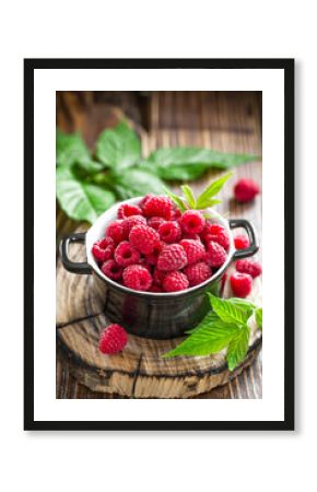 Fresh raspberry with leaves