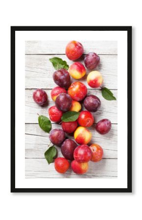 Fresh ripe peaches and plums
