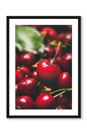 Fresh sweet cherry texture, wallpaper and background. Wet sweet cherries, selective focus, close-up. Summer food or local market produce concept
