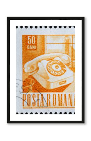 Romania - circa 1968: A post stamp printed in Romania showing a rotary telephone