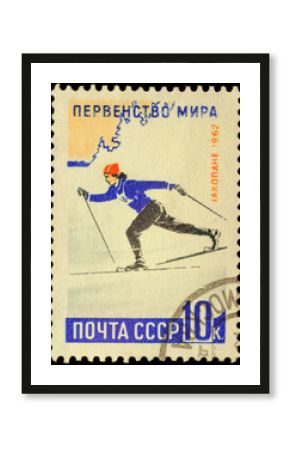 Running woman skier on post stamp