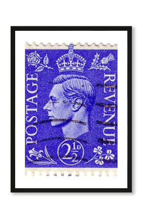UNITED KINGDOM - CIRCA 1937: Postage stamp printed in England (Perfin "CA"), shows King of the United Kingdom and the Dominions of the British Commonwealth, George VI, circa 1937