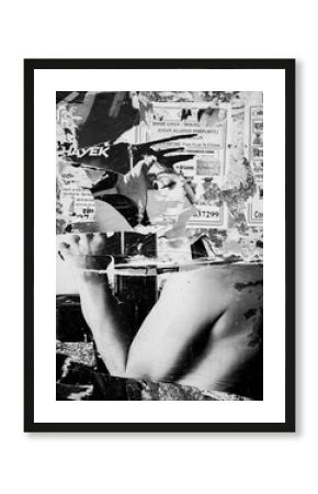 Torn poster on wall