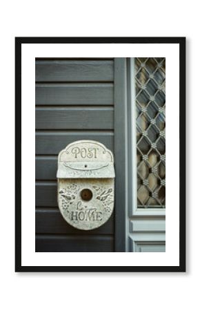 Old mailbox out of a door