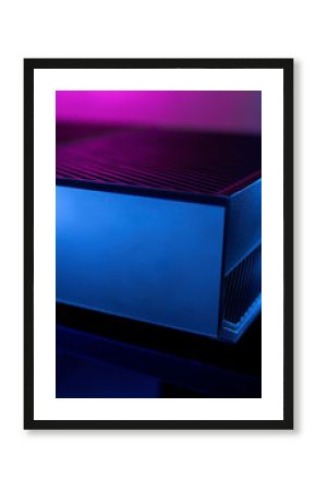 video game console with purple and blue neon lights