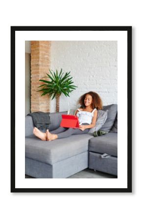 Little girl using a tablet at home